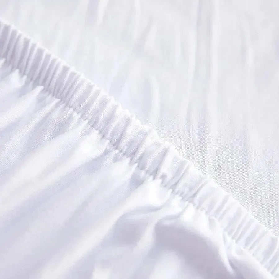 housse-de-canape-extensible-universelle-blanc – La Maison de la Housse