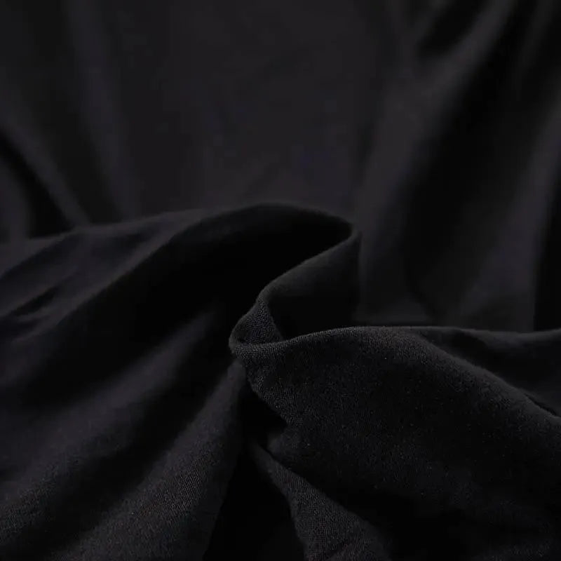 housse-de-canape-extensible-universelle-noir – La Maison de la Housse