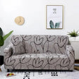 housse-de-canape-ajustables-motif-sagina – La Maison de la Housse