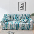 housse-de-canape-extensibles-ajustable-motif-gerani – La Maison de la Housse
