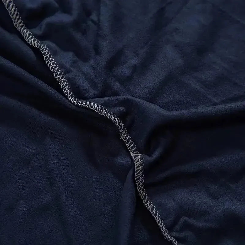 housse-de-fauteuil-extensible-bleu-nuit – La Maison de la Housse