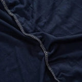 housse-de-fauteuil-extensible-bleu-nuit – La Maison de la Housse