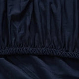 housse-de-fauteuil-extensible-bleu-nuit – La Maison de la Housse