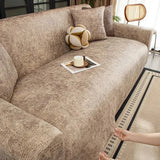 housses-de-canape-effet-cuir-extensibles – La Maison de la Housse