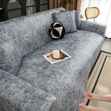 Housses de Canapé Extensibles - Effet Cuir - La Maison de la Housse®
