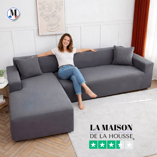 salaon avec canapé d'angle la maison de la housse